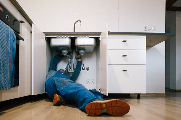 Professional Emergency Plumber technician working in Geneva, IL